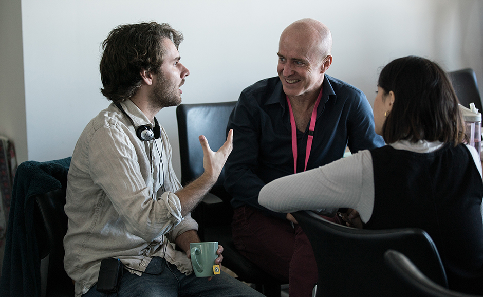 Behind the scenes of TRIBUNAL. L-R: Mason Fleming (director), Screenwest Scripted Executive Ross Grayson Bell and Hannah Ngo (producer). Photo by Liang Xu.