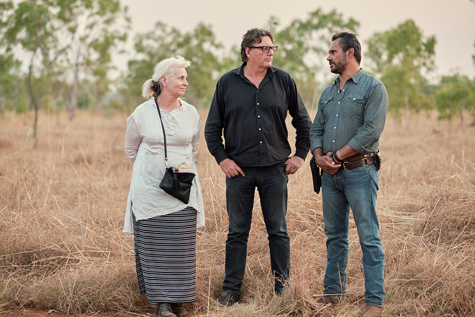 Producers Greer Simpkin and David Jowsey with Aaron Pedersen on the set of MYSTERY ROAD S1, a Bunya Production for ABC TV. Photo by Jack Friels.