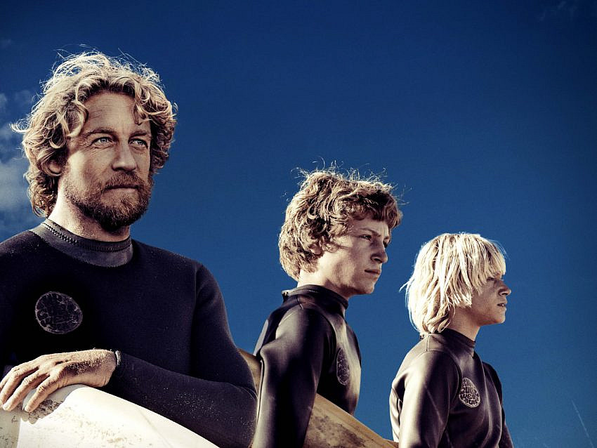 Simon Baker, Samson Coulter and Ben Spence with surfboards